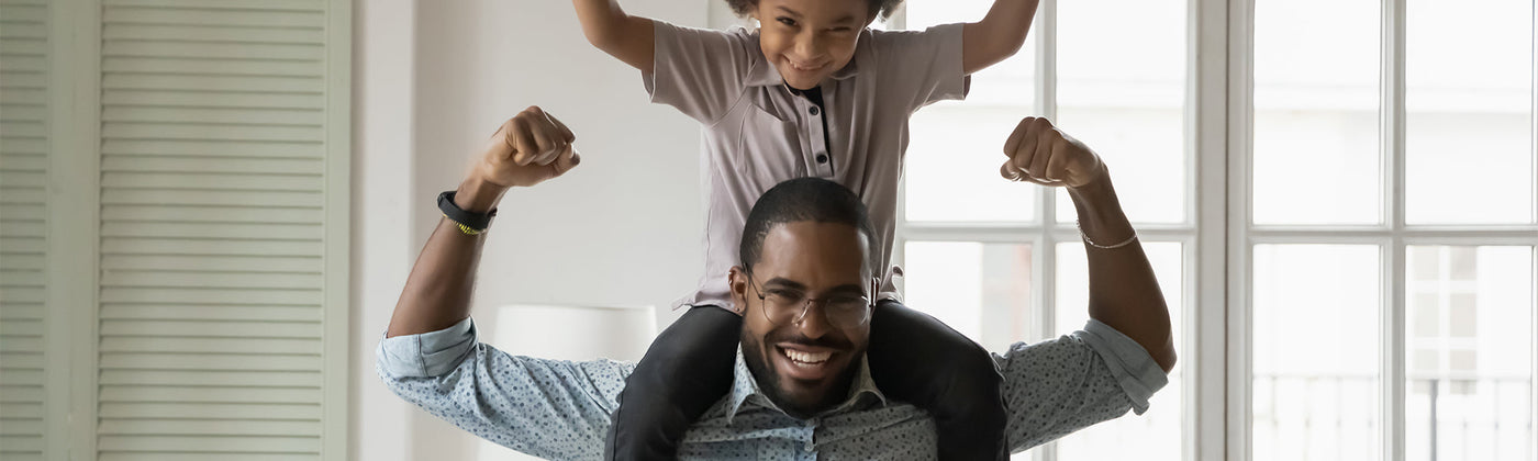 Father with his son on his shoulder