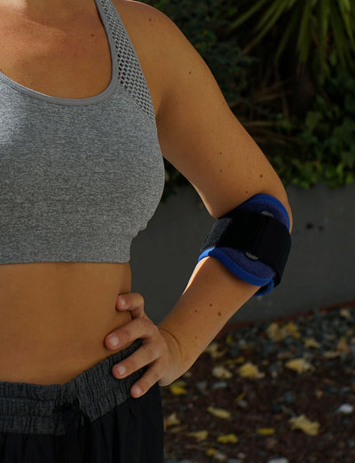 Woman wearing Neo G Tennis/Golf Elbow Strap facing front