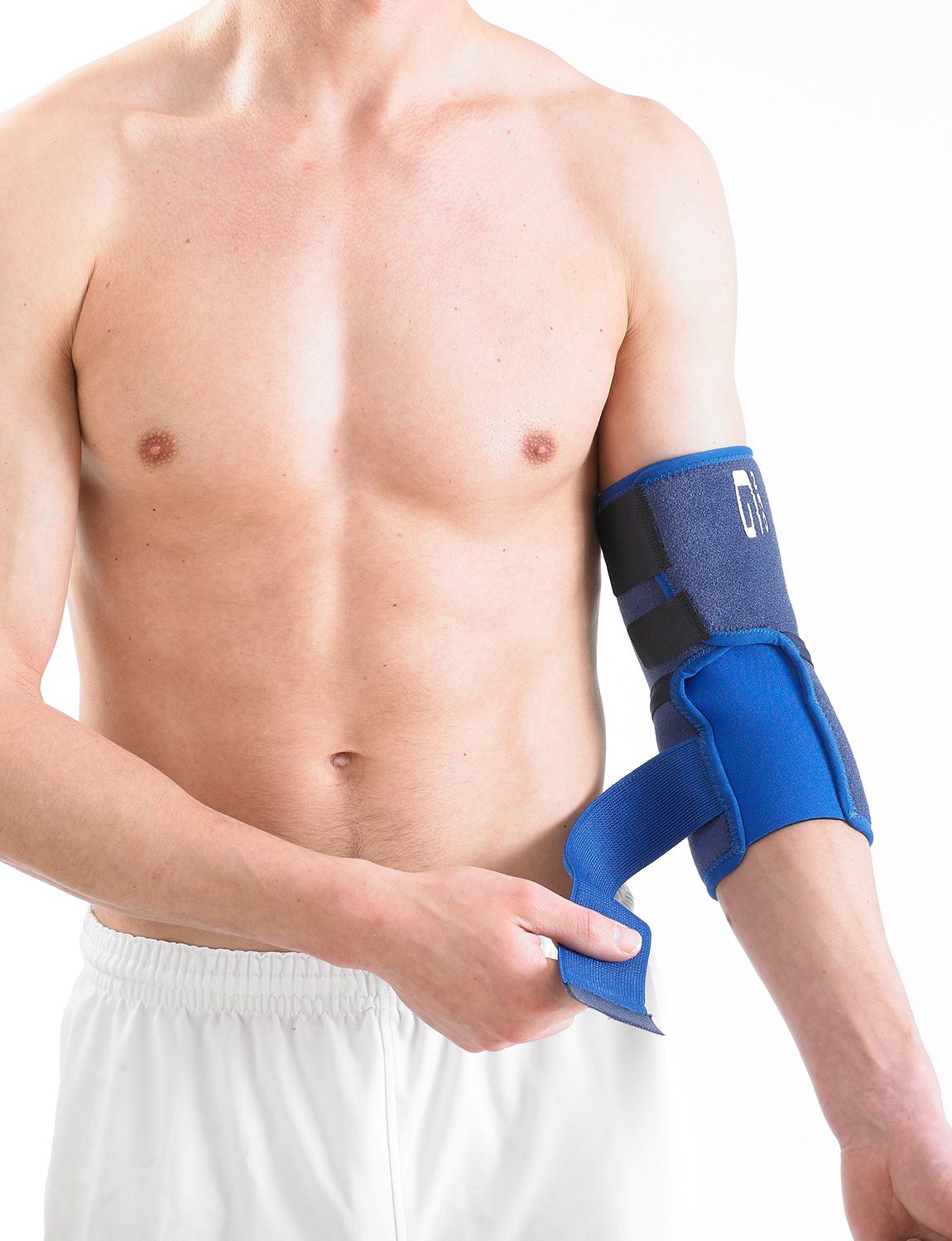 Man wearing Neo G Elbow Support facing front, showing adjustable strap on inner arm