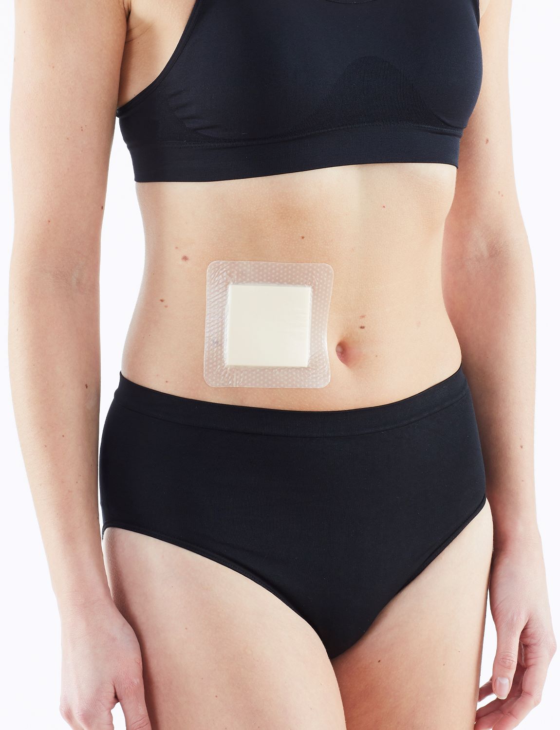 Neo G Silicone Foam Absorbent Dressing on stomach