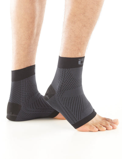 Pair of feet wearing Neo G Plantar Fasciitis Everyday Support, facing side